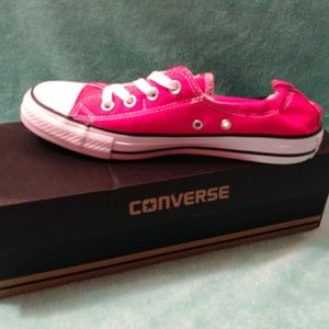 Red converse with slip on back.